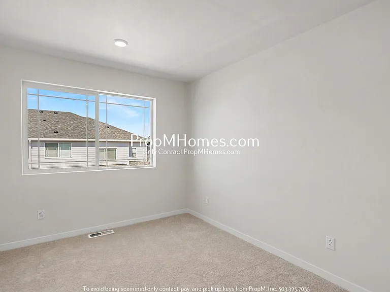 7527 NW Eleanor Ave — Photo 13