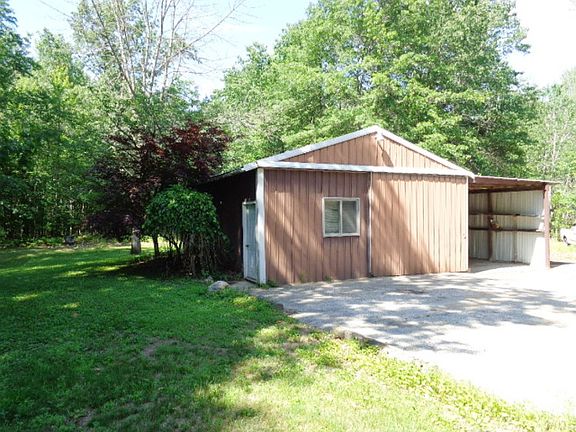 The 24x32 Pole barn with 14x32 attached carport has electricity.