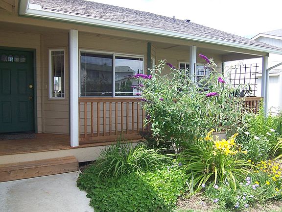 Garden lined walk to front door