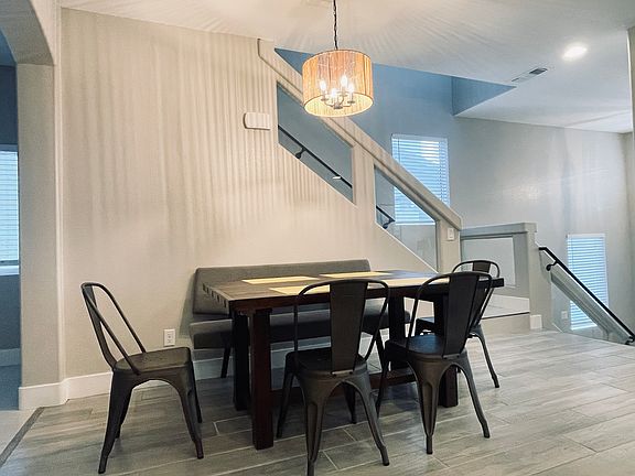 The dining room has dimmable lights for ambiance