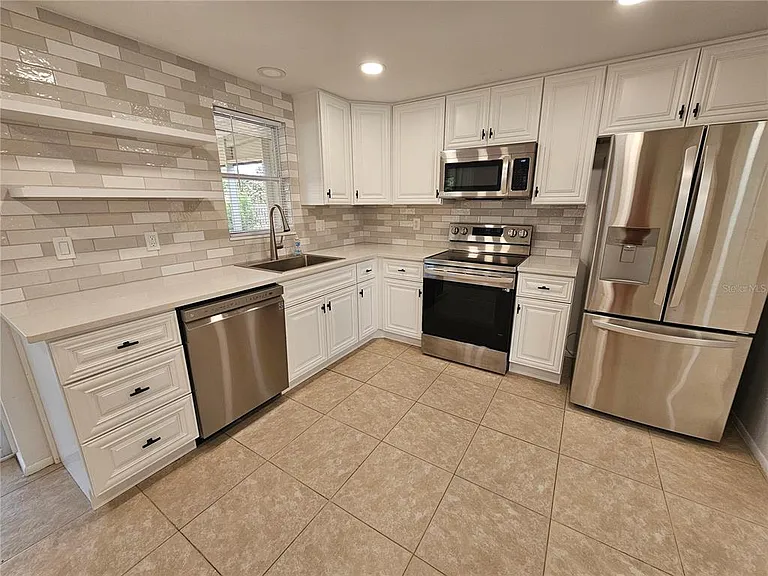 8820 Pohoy Ave — Photo 2