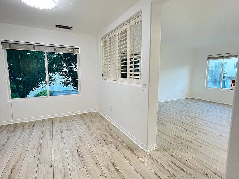 Formal dining and the spacious area in the kitchen- both useable for multiple functions.