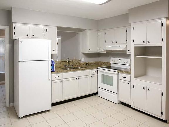 Kitchen with small office/eating area
behind kitchen