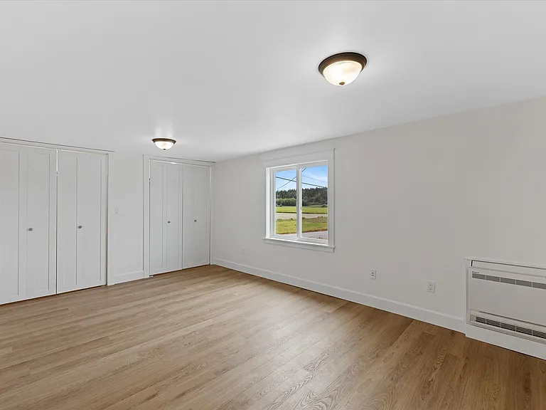 3rd bedroom w/ double closets. Views of farmlands, hills and trees.