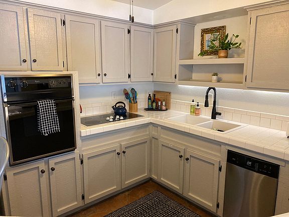 Clean and fully stocked kitchen.