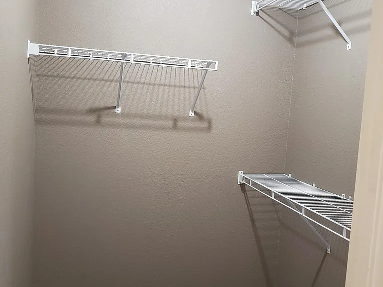 Walk in closet in master bedroom