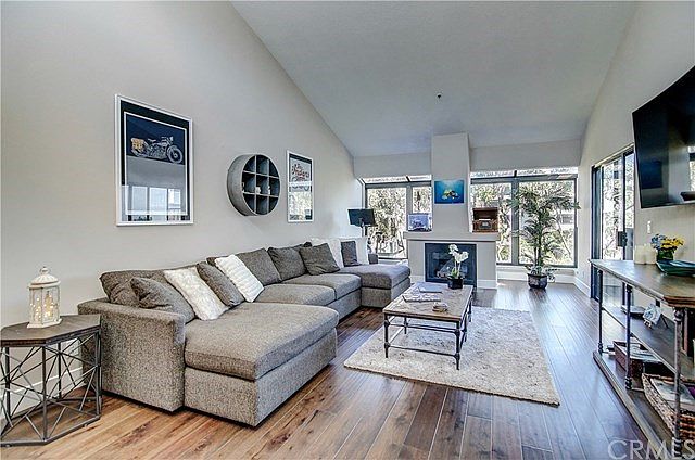 Welcome! Great Room with soaring ceilings and walls of glass.