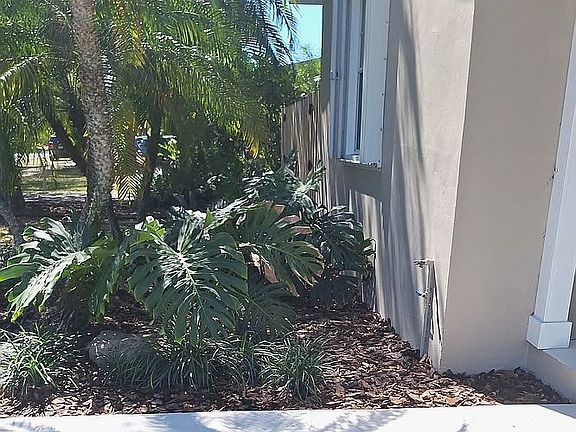 Left of front door