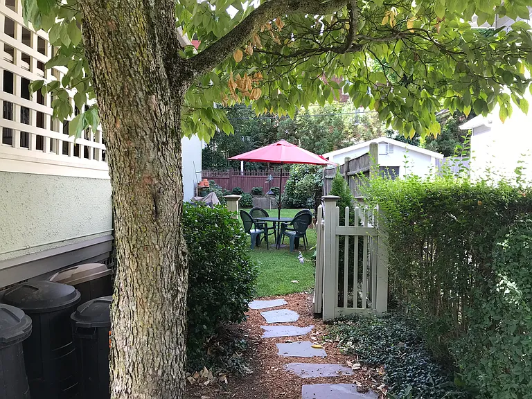 this is what the entrance to the garden looks like from the front walkway of our home.