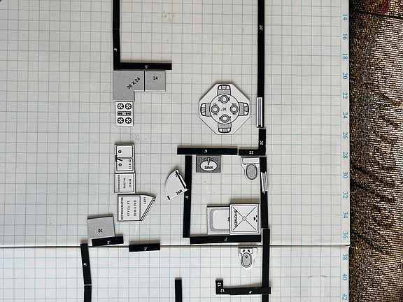 General layout, not perfect put top is living area then dining area/kitchen, there is a pantry, a full bath and then two bedrooms side by side, one has the half bath