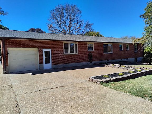 Plenty of parking space and an attached one car garage.