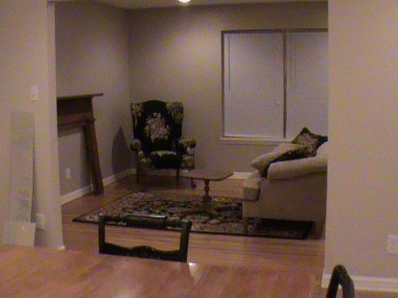 living open into dining and kitchen