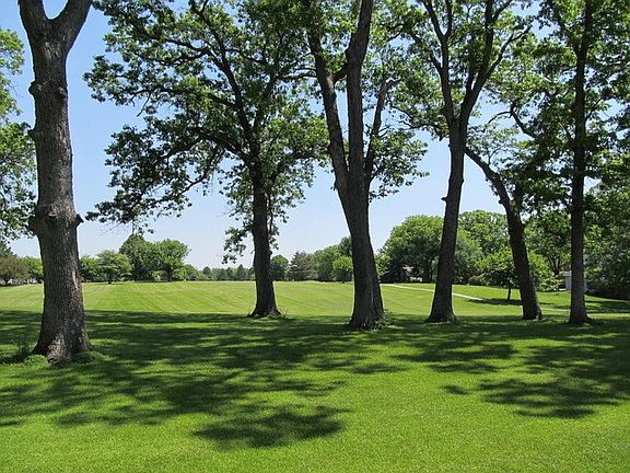 Splendid golf course setting offering serene open views and relaxing ambiance!