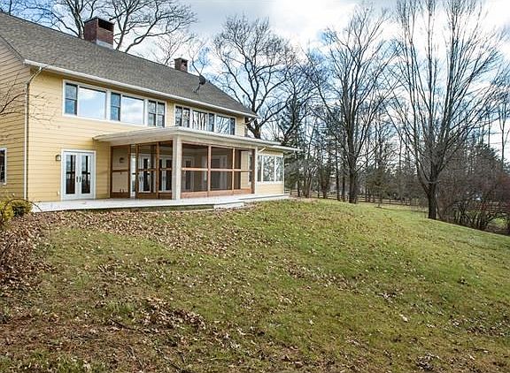 View of the back of the house. Either leave the screens open