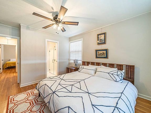 Master Bedroom: King size bed, MCM furnishings, large closet, beautifully crafted new en suite master bathroom.