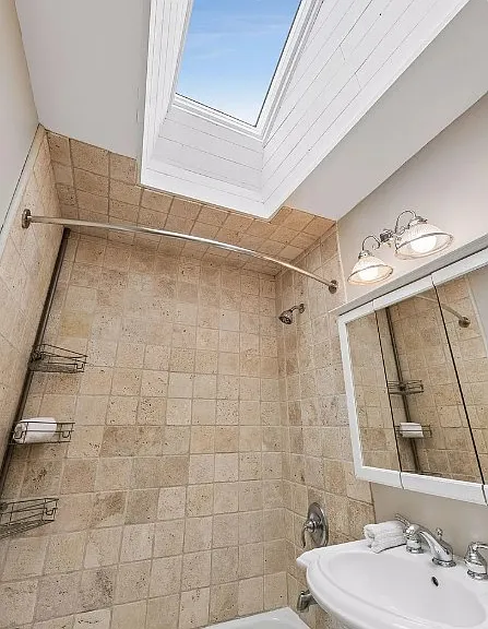 Main floor full bath with skylight