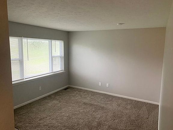 Den and front window.