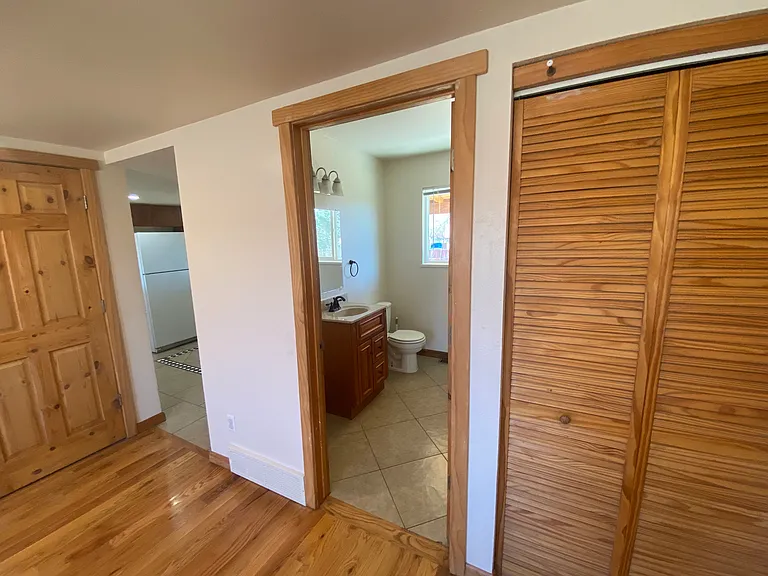 Half bath and laundry room. Washer and dryer included for added convenience.
