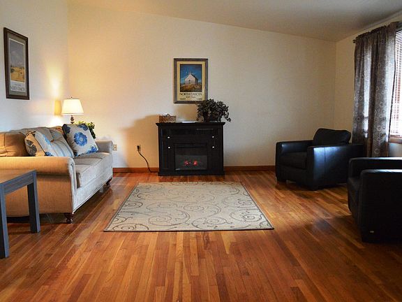 Spacious living room with lots of natural light.