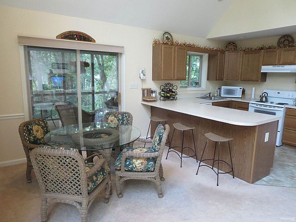Combo shot of dining kitchen porch
