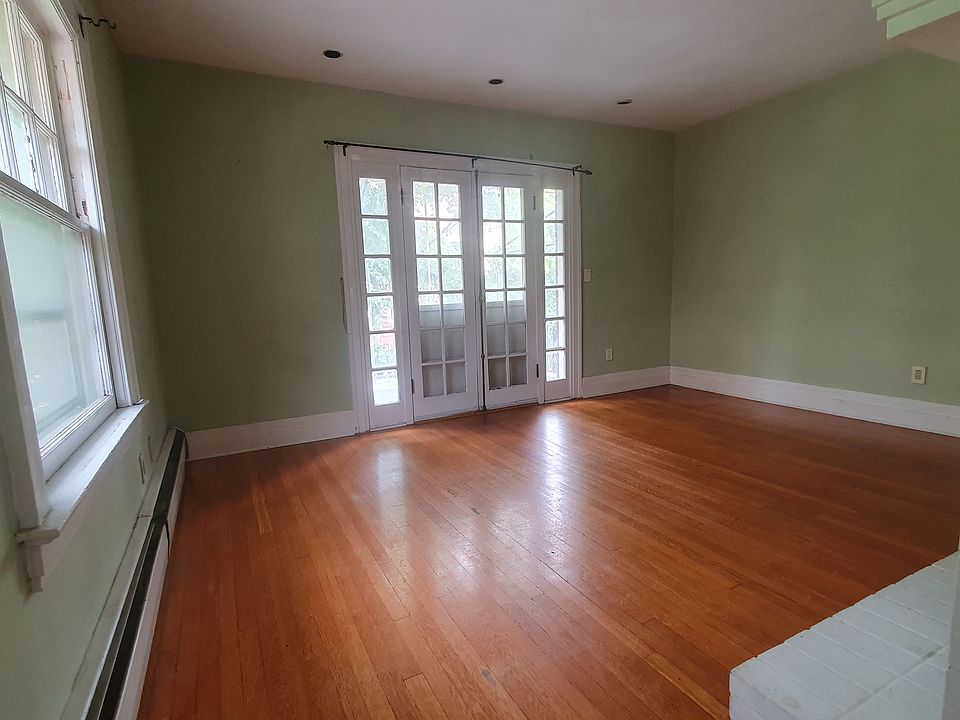 Family room and French doors to private balcony.