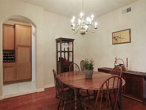 Dining room, doorway to butler's pantry and kitchen.