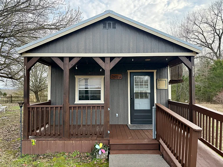 Covered porch entry. Ramp accessible