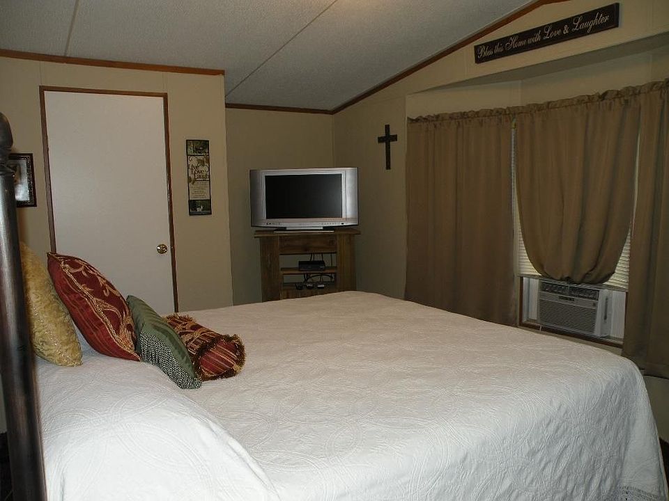 Master with bow window.  Central air and 2 window units included.