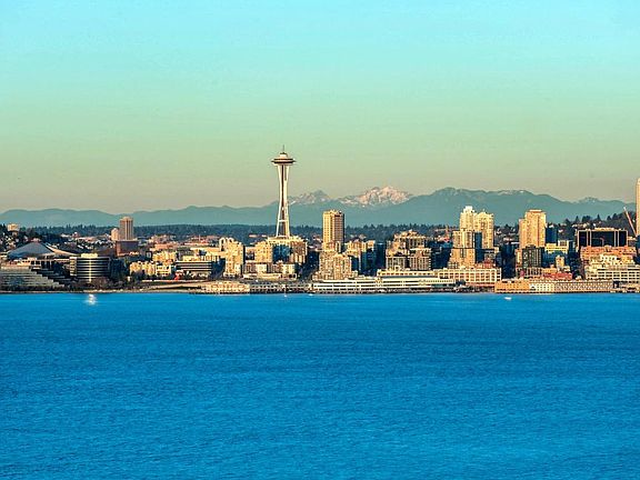 Space Needle and Cascade Mountains.