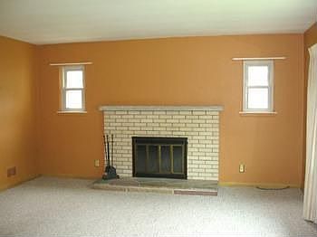 Nice wood burning fireplace in large living room