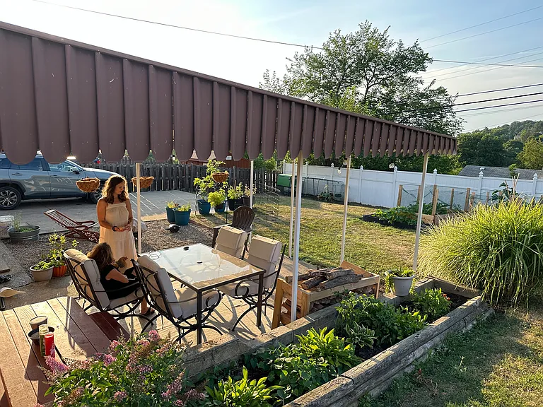 Back patio. Great back yard and garden area. Fully paved driveway, and garage