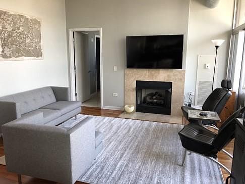 Living room with gas fireplace.