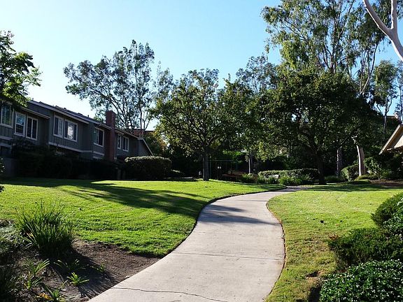 Back patio (by the chimney) is on the greenbelt.