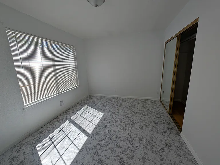 Bedroom 2 (floor stickers have been removed, floor is laminate)