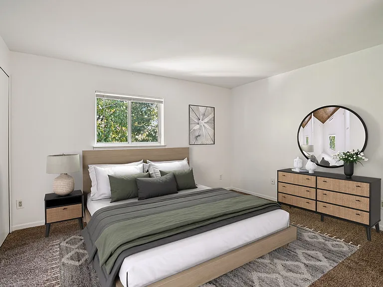 Spacious bedrooms accommodate full bedroom sets including bed, nightstand, and decor (virtually staged), professionally operated by Highlands Vista Group.