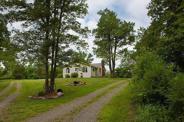 Coming up the driveway.