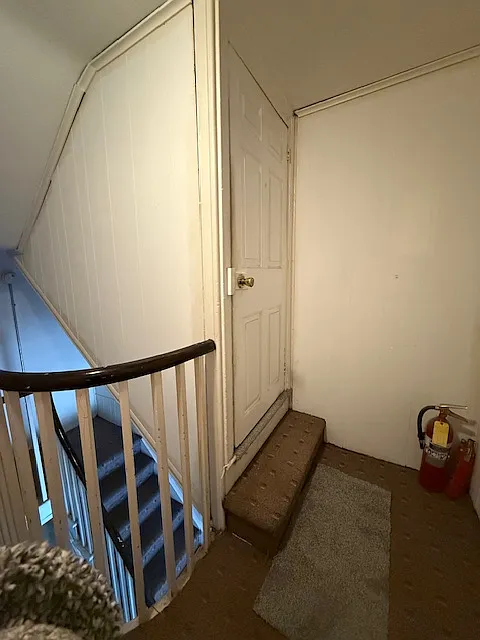 Door to apartment D