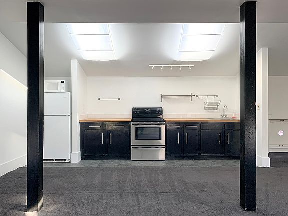 open plan living room / kitchen - view of kitchen
