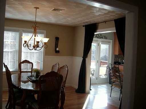 Formal dining room w/wainscoting