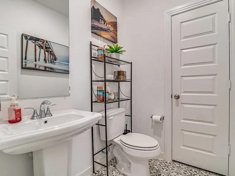 Bathroom with a storage closet