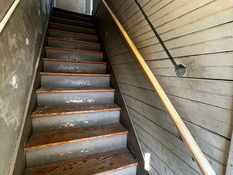 Back stairway with motion sensor light