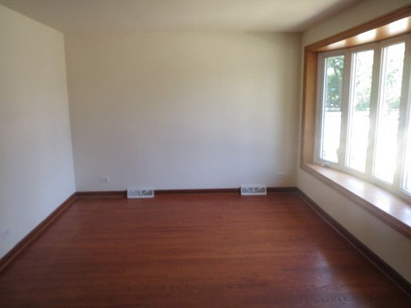 5th image of 5118 S Newland Ave