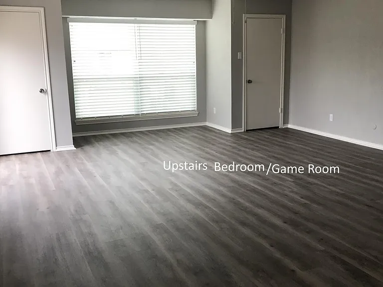 Extra large upstairs bedroom/game room with 2 of 3 closets.
