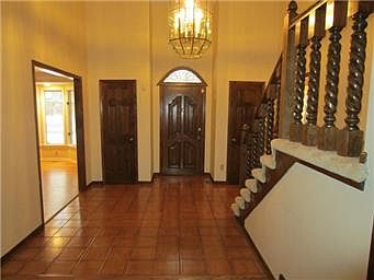 Fabulous front hall with soaring ceiling.