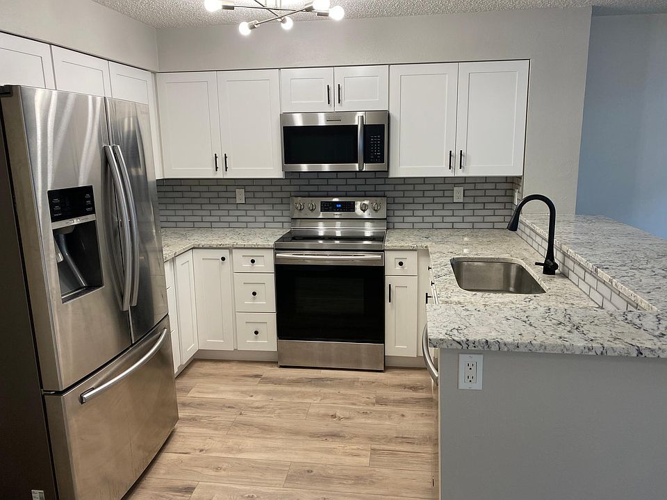Fully remodeled kitchen with stainless steel refrigerator, oven/range, microwave, dishwasher