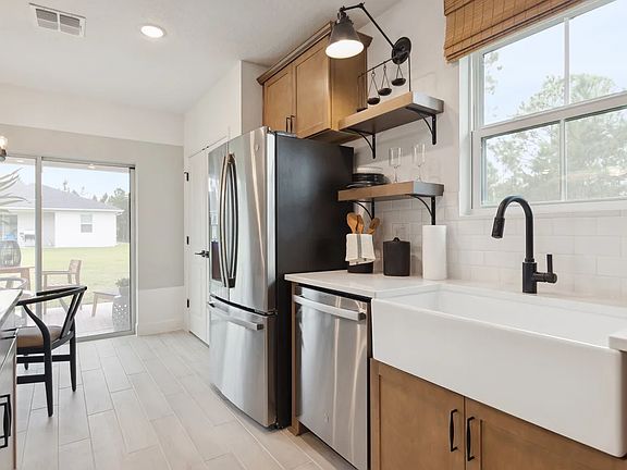 Floating shelves in kitchen