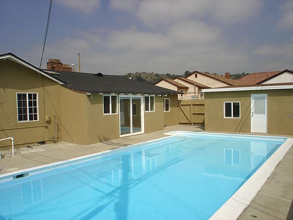 Pool, Rear of Home, and Pool Room