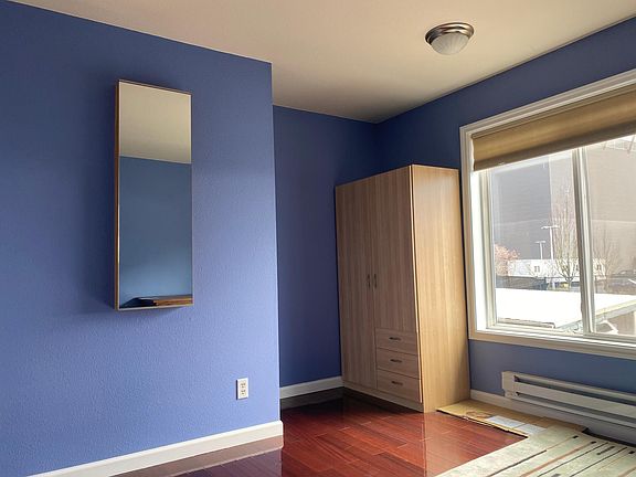 Bedroom #1 with view of the Seahawks training facility (VMAC)