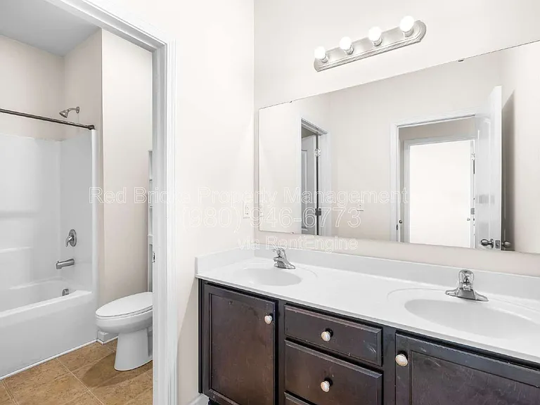 10697 Sky Chase Ave NW — Photo 28