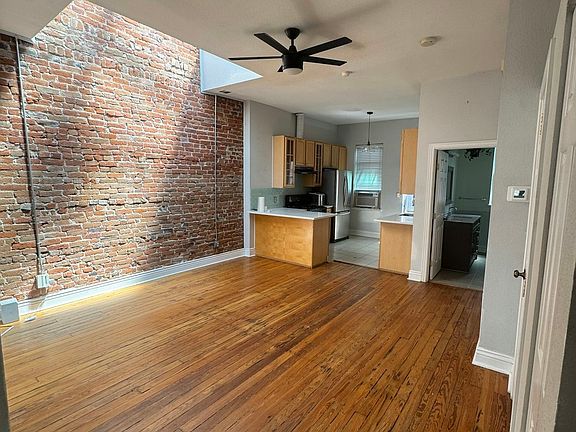 Living room looking at kitchen
